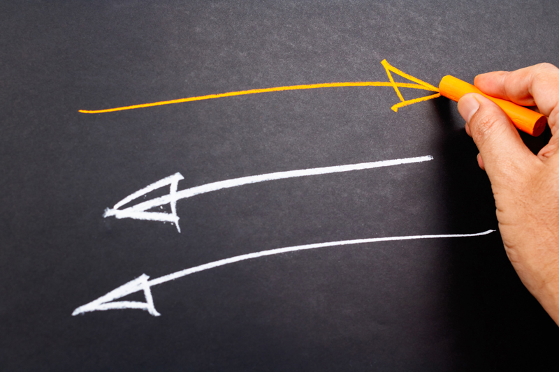 Two arrows facing the left and one arrow facing the left.