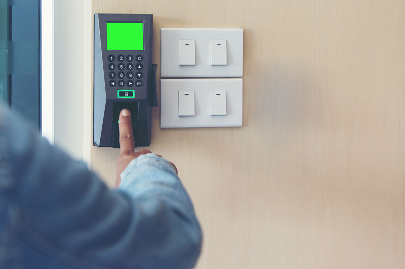 Employee clocking in with fingerprint