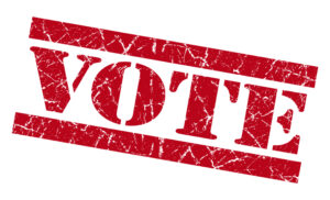 Vote red grunge stamp